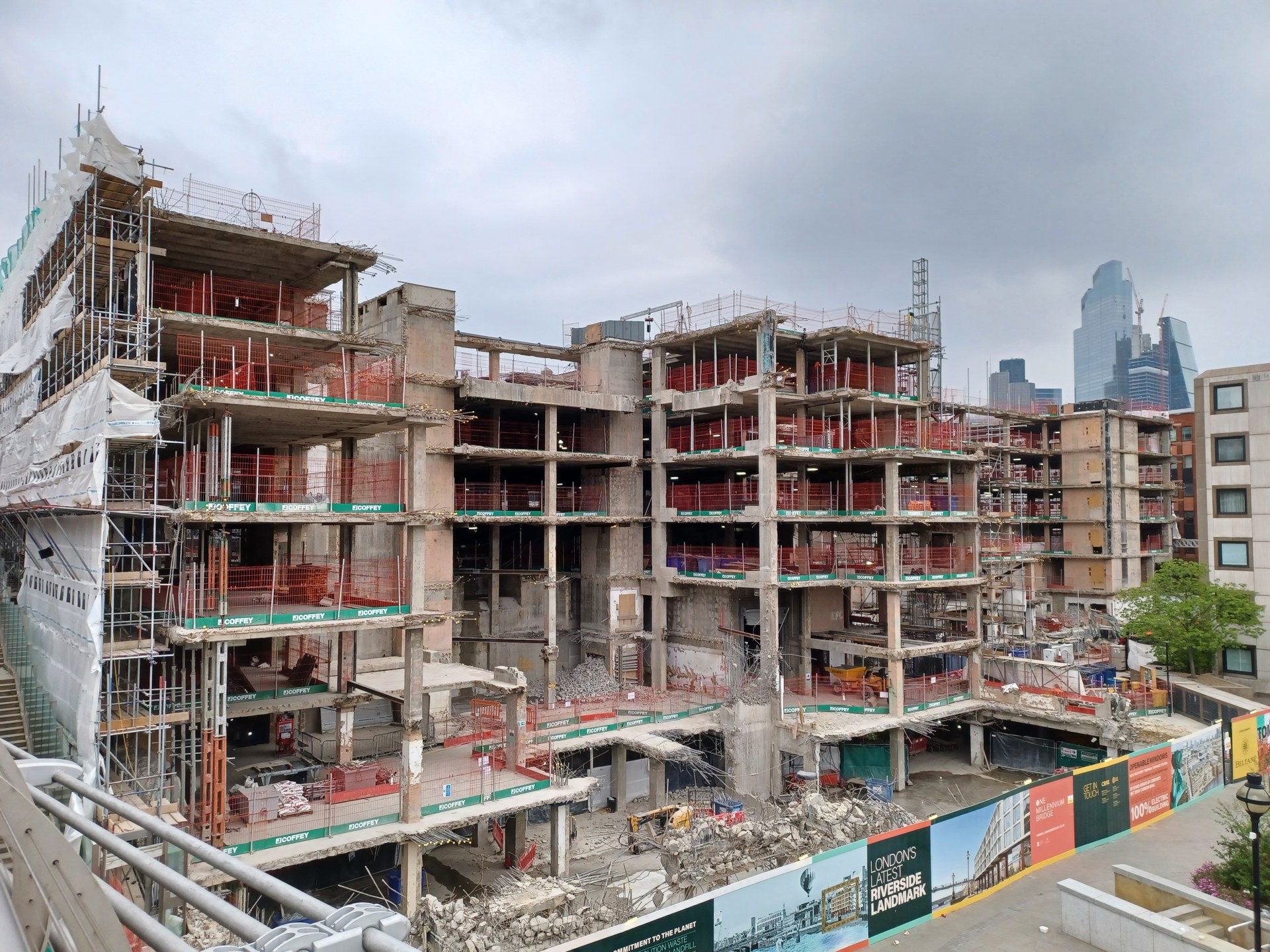 Stripped building shell during partial demolition and refurbishment of Millennium Bridge House, London